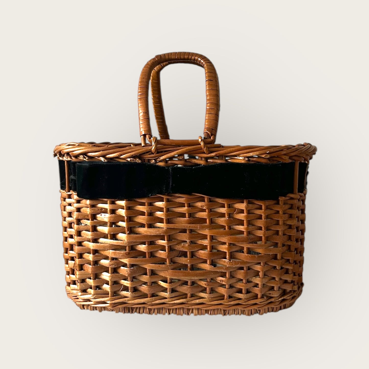 wicker basket bag with velvet bow