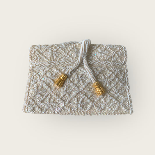 envelope clutch with gold tassles