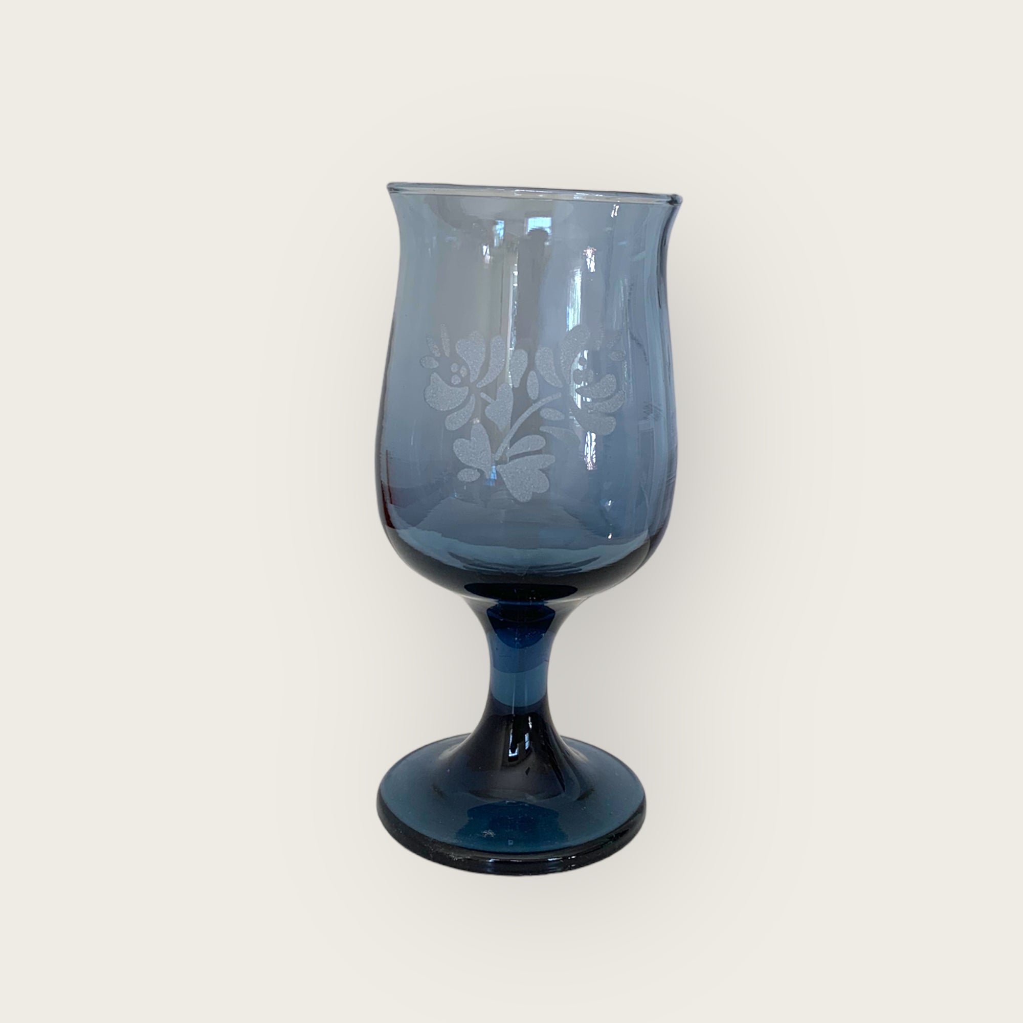 blue colored wine glass